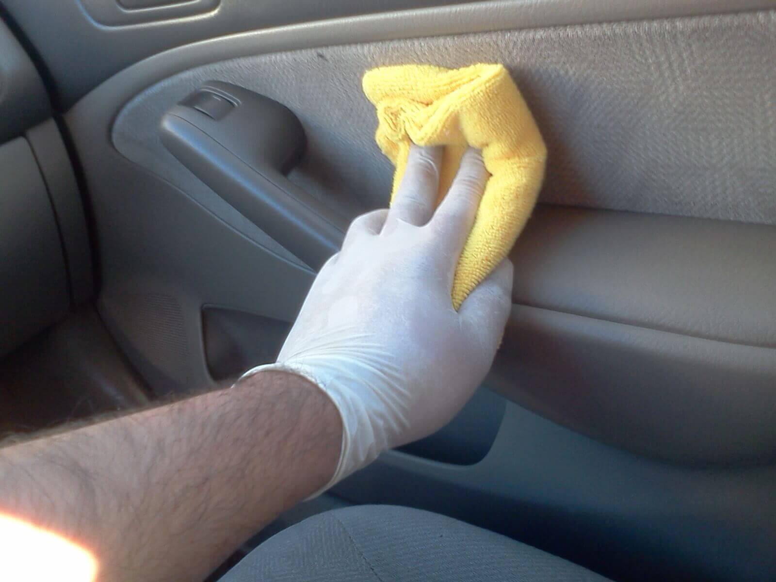 cleaning inside of car dashboard